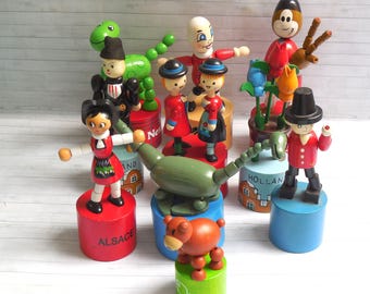 Where in the World ??  -  Push Puppet - Press Up Toy - Wakouwa Wood - Novelty - Alsace - Vienna - Holland - Scotland - New York - Decin -