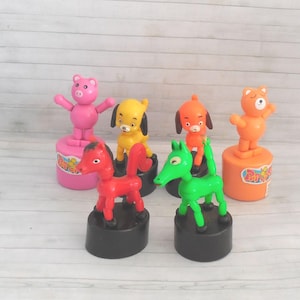 Selection of Vintage Push Puppet Type Novelties -  Press Up Toy - Wakouwa - Plastic Push Puppet  - Stampers - Mini Push Puppets