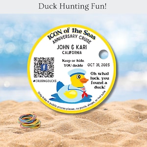 May include: A round white tag with a yellow border featuring a cartoon sailor duck, a QR code, and text including ICON of the Seas, John & Kari, California, Oct 31, 2025, and instructions to keep or hide. A small pile of colorful rubber bands sits nearby.