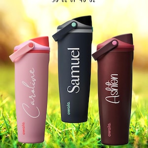 May include: Three insulated water bottles in pink, navy, and burgundy, each with a flip-top lid and handle. The pink bottle is labeled "Caroline", the navy bottle "Samuel", and the burgundy bottle "Ashton". The text "30 oz or 40 oz" is at the top.