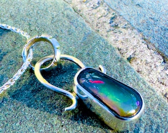 Lightening Storm of color-Natural Opal pendant set in Sterling Silver Alpha Omega pendant