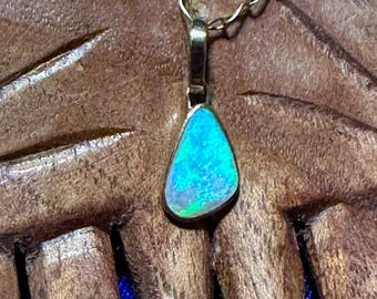Coober Pedy Opal Pendant: 14k Gold, Solid Crystal Australian Opal. Bright and brilliant, see video. Solid crystal 2 sided pendant.