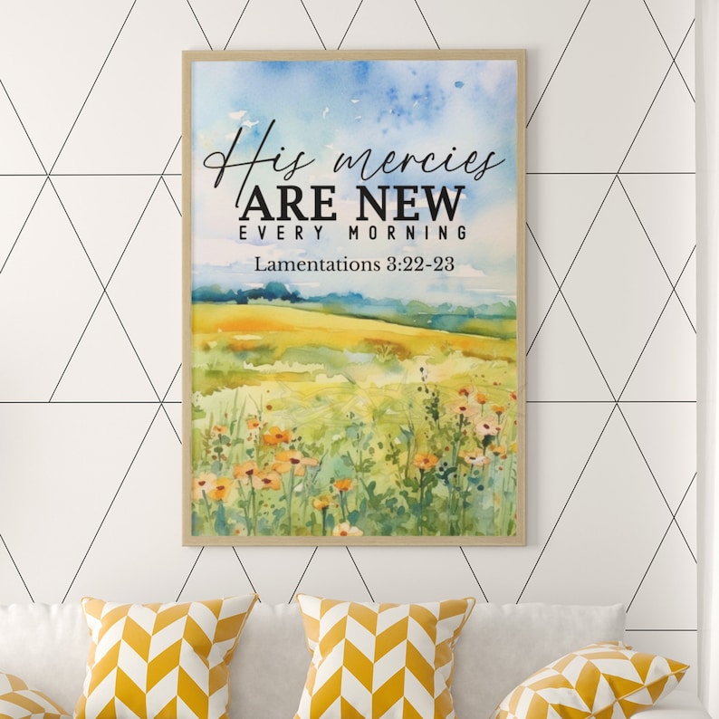 May include: A watercolor painting of a field of flowers with a blue sky in the background. The text "His mercies are new every morning" and "Lamentations 3:22-23" is printed on the painting.