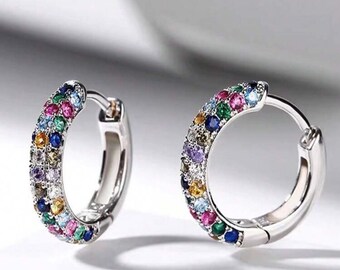 small earrings decorated with rhinestones