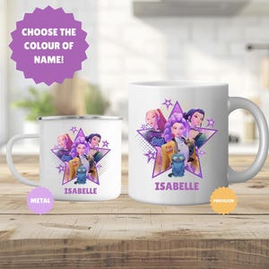 May include: White porcelain mug and metal camping mug featuring a cartoon design of four women in front of a star. The name "Isabelle" is below the image. The text "Choose the colour of name!" is above the mugs.