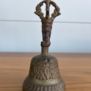 Vintage Brass Hand Bell with Intricate Handle