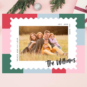 May include: A Christmas card with a photo of a family of five in a field. The card has a colorful background with the words "Peace and Love", "Joy and Hope", and "The Williams".