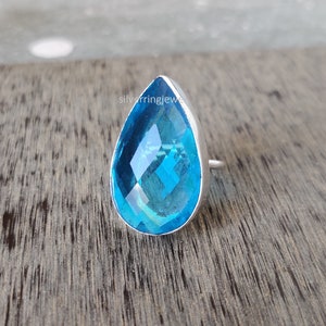 Pear Blue Topaz Ring: Sterling Silver Band, December Birthstone