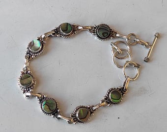 Handgemachtes Abalone Muschel Armband aus 925 Sterling Silber mit einem verstellbaren Edelstein