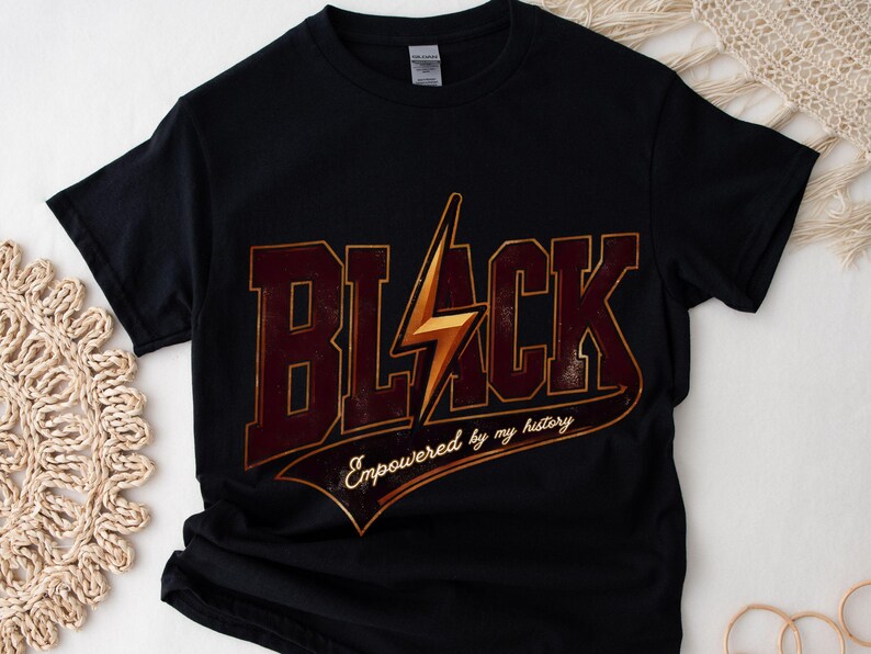 May include: Black t-shirt with a gold lightning bolt graphic and the text "Black Empowered by my history".