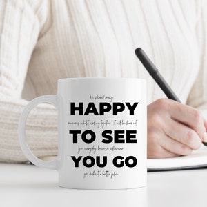 May include: White ceramic mug with a black inscription that reads "We shared many happy memories whilst working together. It will be hard to see you everyday because wherever you go you make it a better place."