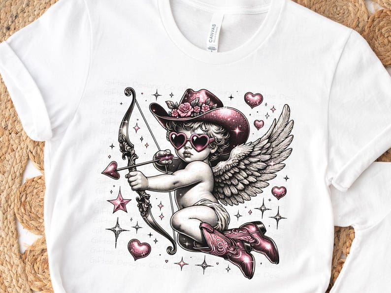 May include: A pink and white illustration of a cupid with wings, wearing a pink cowboy hat and sunglasses, holding a bow and arrow. The cupid is surrounded by pink hearts and stars.
