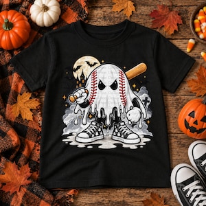 May include: A black t-shirt featuring a graphic of a baseball-shaped ghost with red stitching, holding a wooden baseball bat. The ghost wears black and white high-top sneakers, set against a background of a full moon, bats, and a spooky castle.