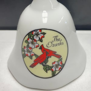 The Ozarks Collectible Souvenir Bell with Cardinals on Dogwood Branch.