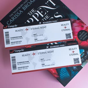 May include: Two VampAir boarding passes with the text "Reality" and "Eternal Night" are displayed over a book. The passes have a red border and include the passenger name "The Bloodsuckers" and the departure date "Friday the 15th". The book cover is black and red.