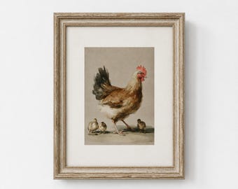 May include: Framed watercolour print depicting a hen with brown and white plumage, a red comb, and a black tail, accompanied by three chicks. The artwork is in a light brown wooden frame, suitable for country-style interiors.