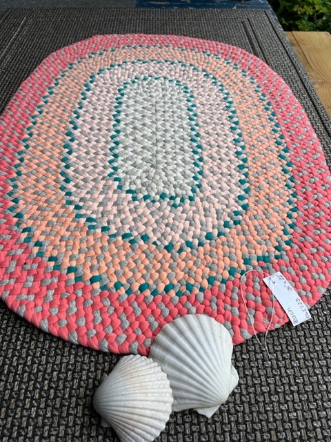 Braided peach themed accent rug oval 31" x 22"