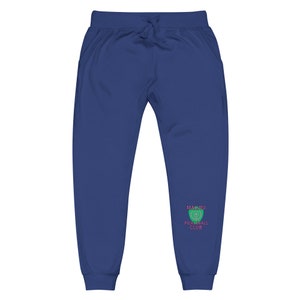 May include: Navy blue sweatpants with a green and pink logo that says "Malibu Pickleball Club".