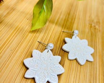 Holiday festive white snowflake earrings