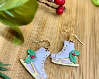 Festive pink ice skate huggie earrings
