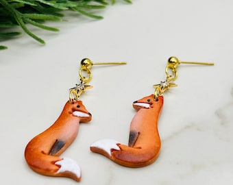 North Star winter fox dangle earrings