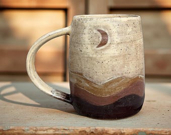 Warm sky ceramic mountain mug with sun and moon