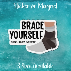 May include: A white sticker or magnet with a black ankle brace and the text "BRACE YOURSELF EHLERS-DANLOS SYNDROME".