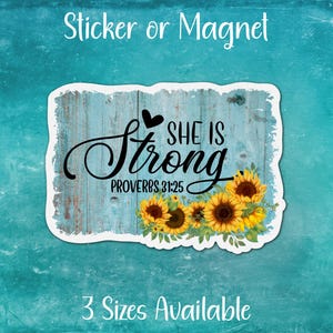 May include: A blue and white woodgrain background with a heart and the text "She is Strong Proverbs 31:25".  The background is decorated with yellow sunflowers.