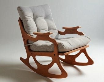 Mecedora de madera hecha a mano para leer, un rincón relajante y tranquilo, una silla cómoda y única.