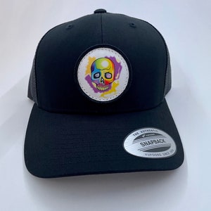 SnapBack hat (RainbowSkull)