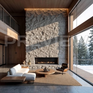 May include: A modern living room with a stone fireplace, a white sectional sofa, and a wooden coffee table. A black leather armchair sits near the window, which offers a view of a snowy forest. The room has a warm, inviting atmosphere.
