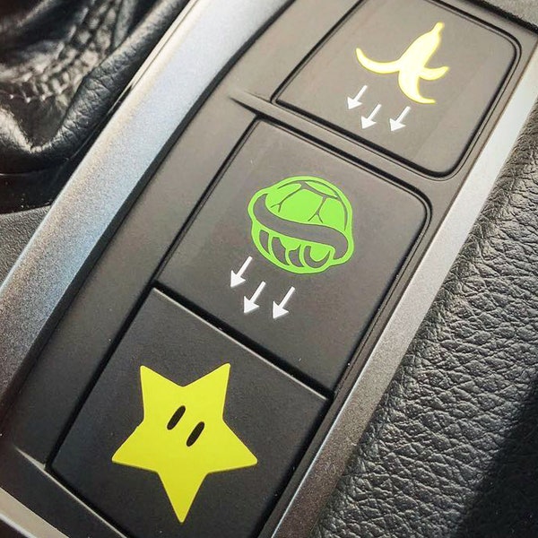 6 Pack blank button decals stickers: Star, Shell, and Banana x2. Fits all blank car buttons! Compatible with Civic, Wrangler, and many more!