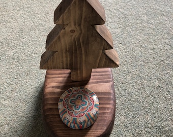 Christmas tree decoration handmade from reclaimed wood with candle