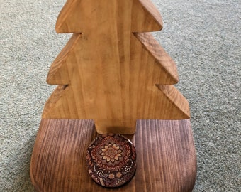 Christmas tree decoration handmade from reclaimed wood with candle