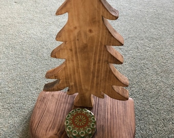 Christmas tree decoration handmade from reclaimed wood with candle