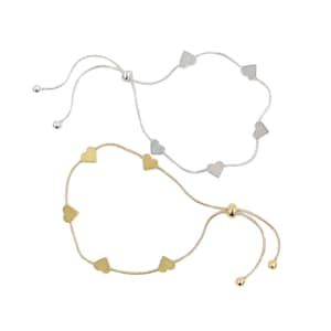 May include: Two adjustable bracelets with heart charms. One bracelet is gold and the other is silver.