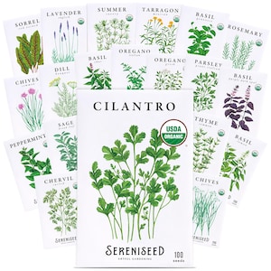 May include: A collection of white seed packets featuring botanical illustrations of various herbs including cilantro, lavender, basil, rosemary, and thyme. Each packet displays the plant name, a USDA Organic seal, and the brand name Sereniseed.