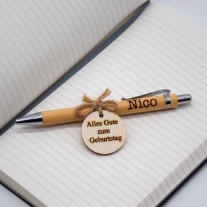 Personalized ballpoint pen with engraving made of bamboo wood