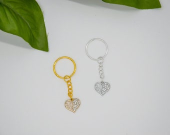Heart keychain with two hearts inside and glitter in the colors silver or gold