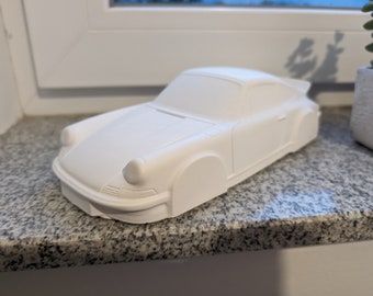 Porsche 911 Ikone Skulptur Keramik weiß Dekoelement Auto Kunstform Gibs Gips Modell Model Geschenk Geburtstag Männergeschenk zum bemalen