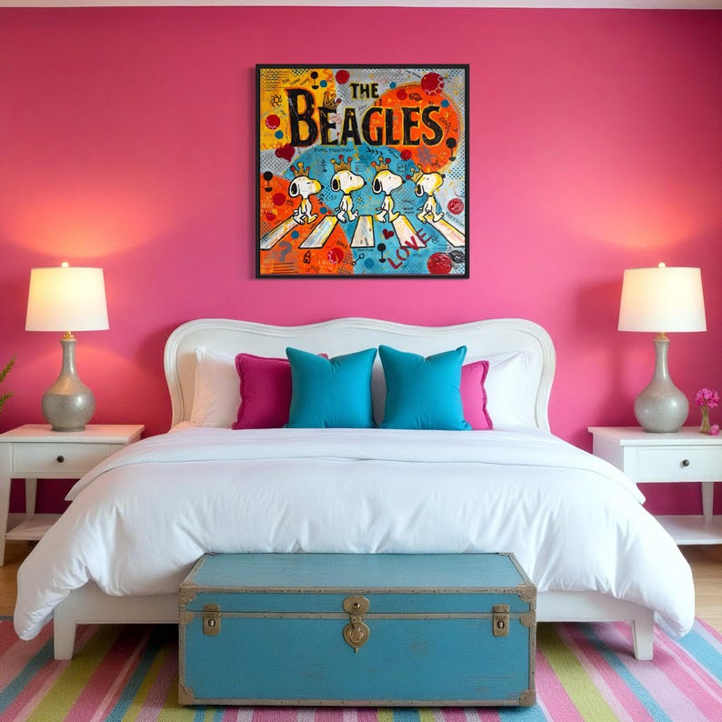 May include: A bedroom with a white bed frame, white bedding, and a blue trunk at the foot of the bed. The walls are bright pink, and a framed artwork of Snoopy and Woodstock crossing a street is above the bed. Two lamps sit on white nightstands.