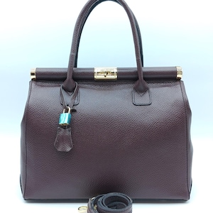Bolso de mano italiano Lock & Key de piel auténtica (tratada) color burdeos, fabricado en Italia.