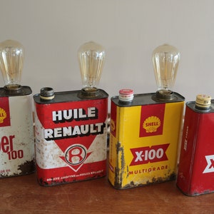Vintage lamp, original industrial-style decoration. Old metal can