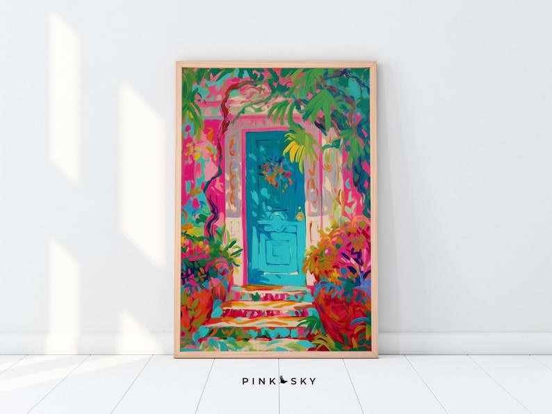 May include: A painting of a bright blue door with a wreath, surrounded by lush green foliage and vibrant pink and orange flowers. The door is set against a pink wall and leads to a set of steps.
