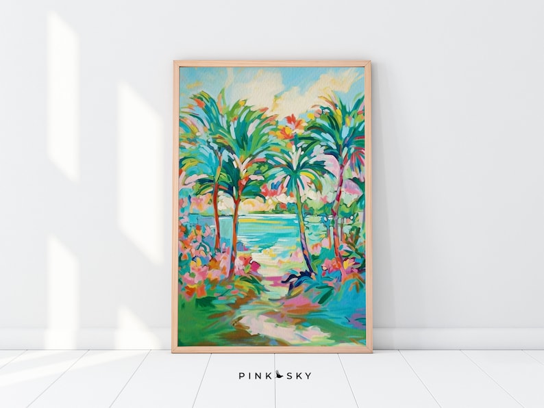 May include: A framed painting of a tropical scene with palm trees, lush greenery, and a blue ocean in the background. The painting is done in a vibrant, colorful style with shades of green, blue, pink, and yellow.