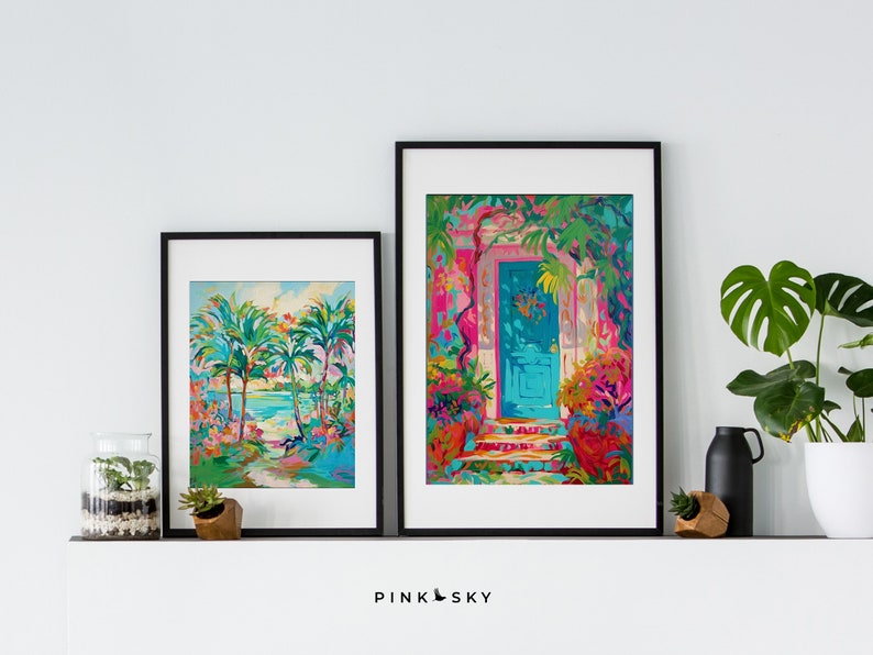 May include: Two framed paintings with colorful tropical scenes. The painting on the left shows palm trees and a beach. The painting on the right shows a blue door with a pink and green background.
