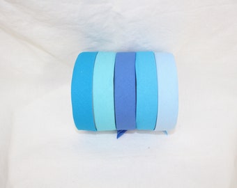 Bias Binding (tape) 25mm, single fold. sky, marine, regatta blue, bluebell. Fusible iron on available. 100% cotton.