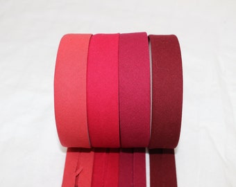 Bias Binding (tape) 25mm, single fold. brick red, rosewood, rumba, red, crimson. Fusible iron on available. 100% Cotton