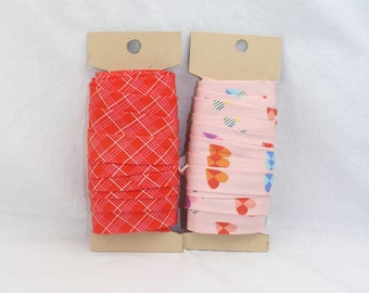 Bias Binding (Tape) 25mm, Cotton,  Single Fold, red pattern, hearts. Fusible iron on available.