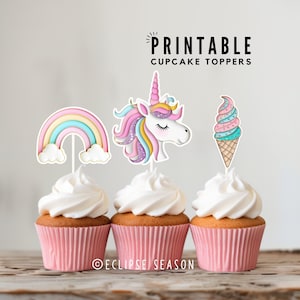 May include: Printable cupcake toppers featuring a rainbow, a unicorn head, and an ice cream cone. The toppers are on pink cupcake liners with white frosting.